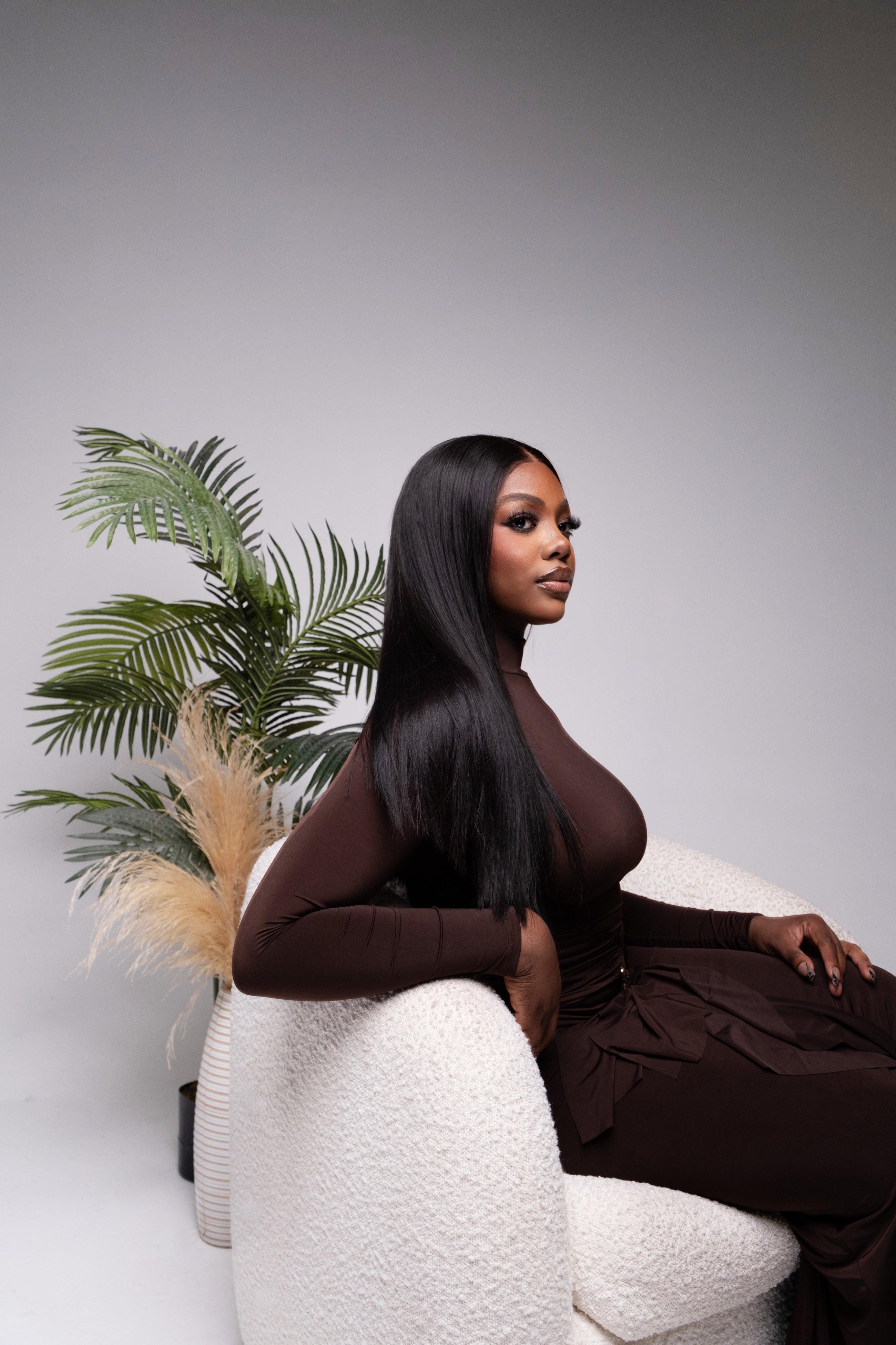 Model wearing long straight AHB hair extensions